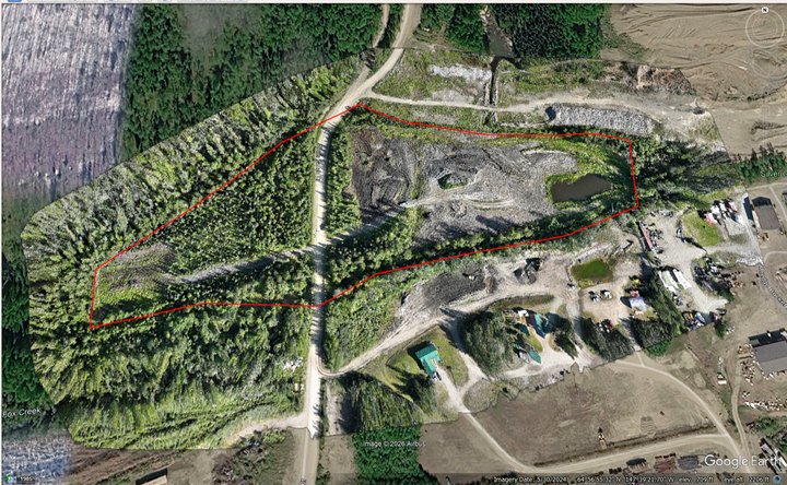 Land-development orthophoto displayed over Google Earth imagery with an approximate project area outline